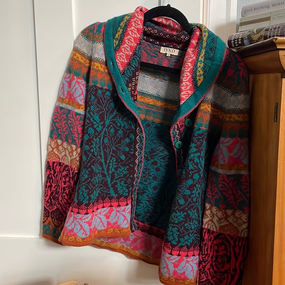 Ivko sweater. Multi-colored with patterns. It buttons up.